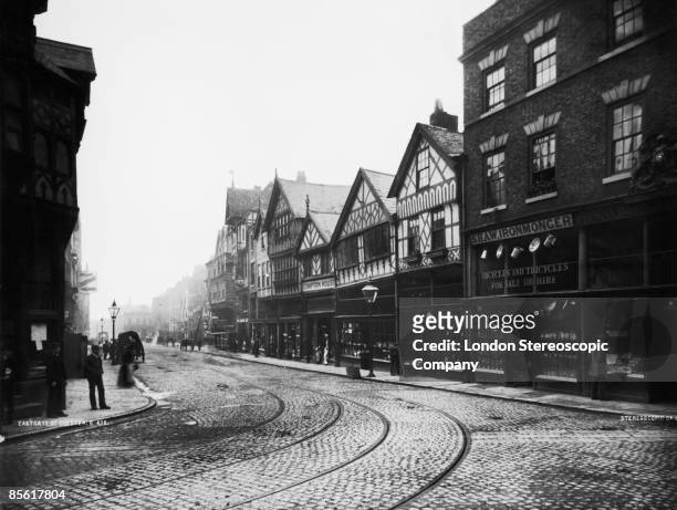 View down Eastgate Street in the town of Chester, Cheshire, circa 1880.