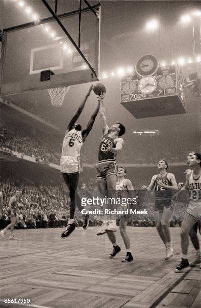 Finals: Boston Celtics Bill Russell in action, getting rebound vs St. Louis Hawks Cliff Hagan . Boston, MA 3/30/1957--4/13/1957 CREDIT: Richard Meek