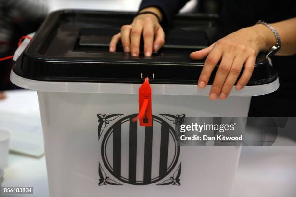 Ballot box is closed at a polling station as voting continues in the referendum on October 1, 2017 in Barcelona, Spain. More than five million...