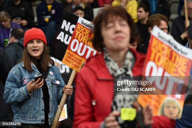 Protesters take part in an anti-austerity demonstration organised by The People's Assembly in Manchester to coincide with the first day of the...