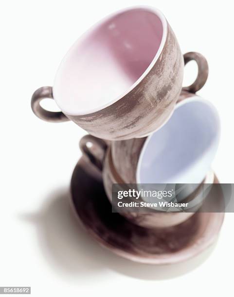 stack arrangement of empty coffee cups and saucer - stackable foto e immagini stock