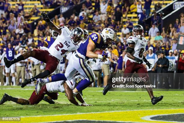 Tigers tight end Foster Moreau scores a touchdown during a game between the LSU Tigers and Troy Trojans at Tiger Stadium in Baton Rouge, Louisiana on...