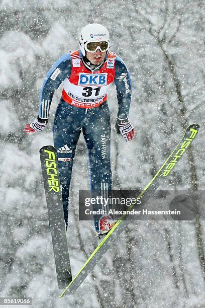 Johnny Spillane of USA jumps during the Ski Jumping 100m Hill competition of the Nordic Combined event at the FIS Nordic World Ski Championships 2009...