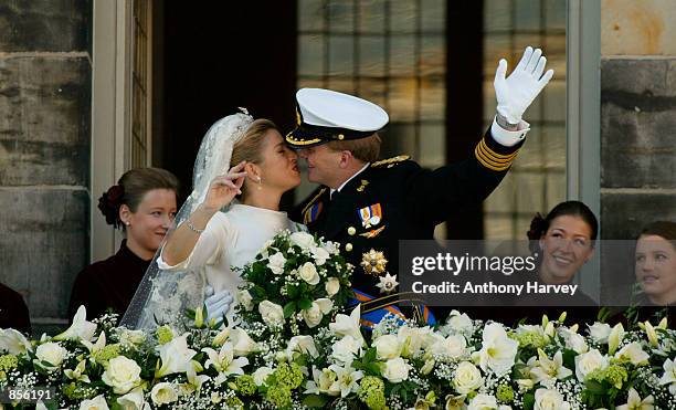 Dutch Crown Prince Willem Alexander and his new bride Crown Princess Maxima Zorreguieta kiss after their wedding February 2, 2002 on the balcony of...