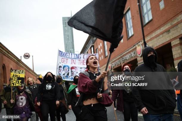Protesters take part in an anti-austerity demonstration organised by The People's Assembly in Manchester to coincide with the first day of the...