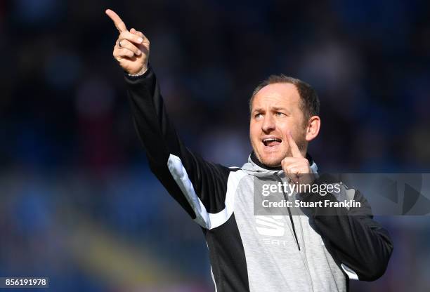 Torsten Lieberknecht, head coach of Braunschweig points during the Second Bundesliga match between Eintracht Braunschweig and FC St. Pauli at...