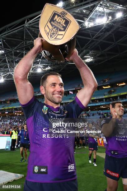 Cameron Smith of the Storm holds aloft the Provan-Summons Trophy after winning the 2017 NRL Grand Final match between the Melbourne Storm and the...