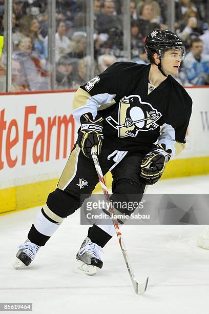 Forward Chris Kunitz of the Pittsburgh Penguins skates against the Calgary Flames on March 25, 2009 at Mellon Arena in Pittsburgh, Pennsylvania.