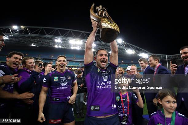 Cameron Smith of the Storm walks off the field with team mates Billy Slater and Cooper Cronk during the 2017 NRL Grand Final match between the...
