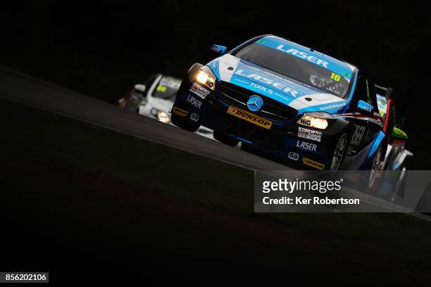 Aiden Moffat of Laser Tools Racing Mercedes drives on his way to winning race one during the British Touring Car Championship finale at Brands Hatch...