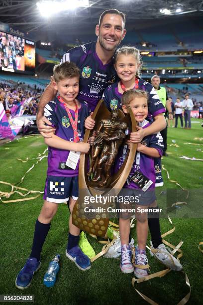 Cameron Smith of the Storm poses with his children after winning the 2017 NRL Grand Final match between the Melbourne Storm and the North Queensland...