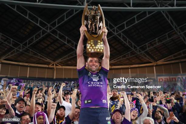 Cameron Smith of the Storm holds aloft the Provan-Summons Trophy after winning the 2017 NRL Grand Final match between the Melbourne Storm and the...