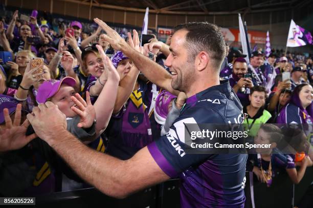 Cameron Smith of the Storm celebrates after winning the 2017 NRL Grand Final match between the Melbourne Storm and the North Queensland Cowboys at...