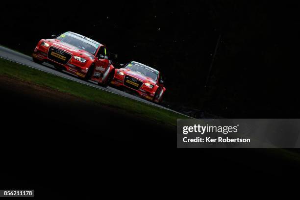Ollie Jackson of AmDtuning Audi leads from team mate Ant Whorton-Eales during race one of the British Touring Car Championship finale at Brands Hatch...