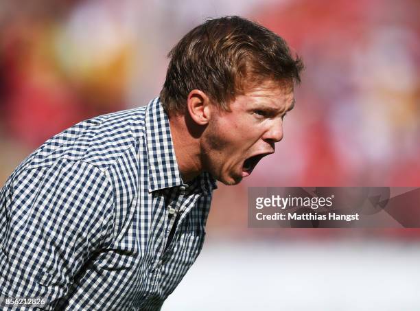 Julian Nagelsmann head coach of 1899 Hoffenheim screams instructions during the Bundesliga match between Sport-Club Freiburg and TSG 1899 Hoffenheim...