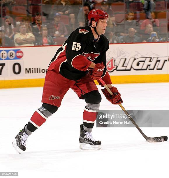 Ed Jovanovski of the Phoenix Coyotes skates the puck up ice against the Vancouver Canucks on March 21, 2009 at Jobing.com Arena in Glendale, Arizona.
