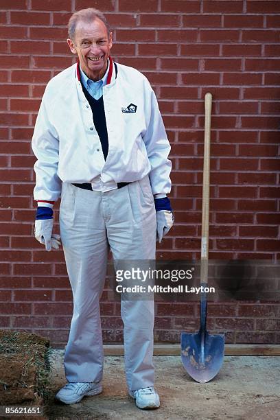 Abe Pollin, owner of the Washington Wizards rakes dirt during a Washington Wizards community event during the 1999 season in Washington D.C. NOTE TO...