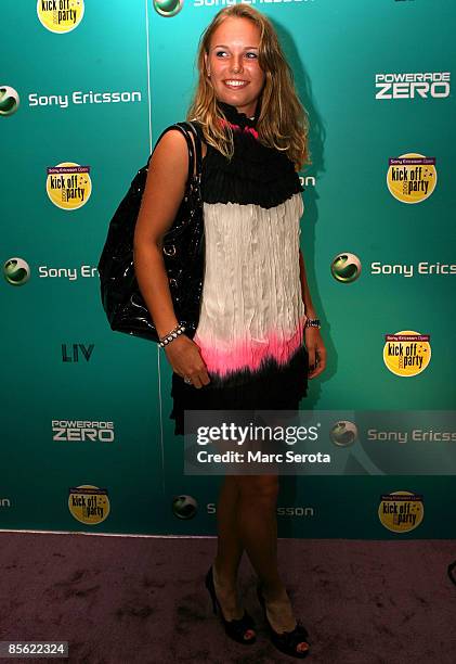 Tennis player Caroline Wozniacki of Denmark arrives on the red carpet of the players kick off party prior to the Sony Ericsson Open at the LIV club...