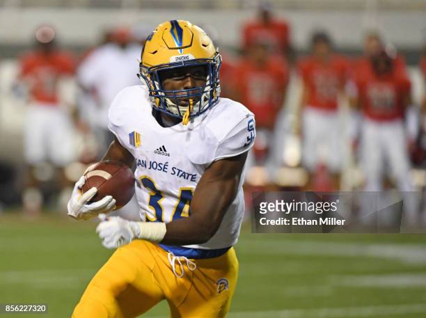 Running back Zamore Zigler of the San Jose State Spartans runs against the UNLV Rebels during their game at Sam Boyd Stadium on September 30, 2017 in...