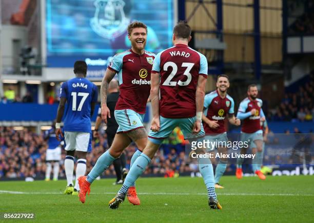 Jeff Hendrick of Burnley celebrates scoring his sides first goal with Stephen Ward of Burnley during the Premier League match between Everton and...