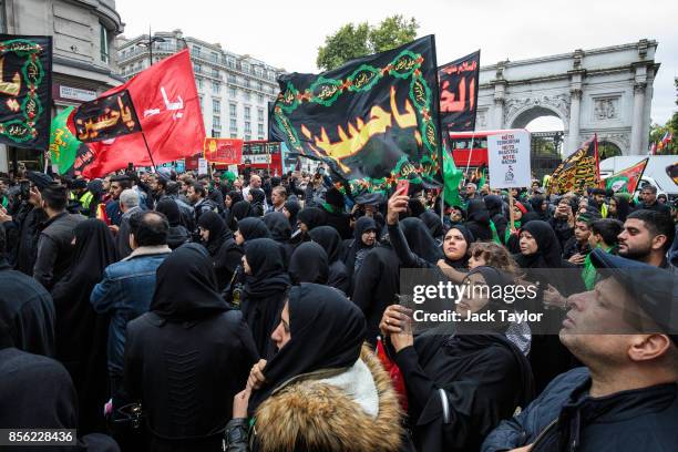 Protesters gather with flags and placards ahead of the annual Ashura march in Marble Arch on October 1, 2017 in London, England. Hundreds of...