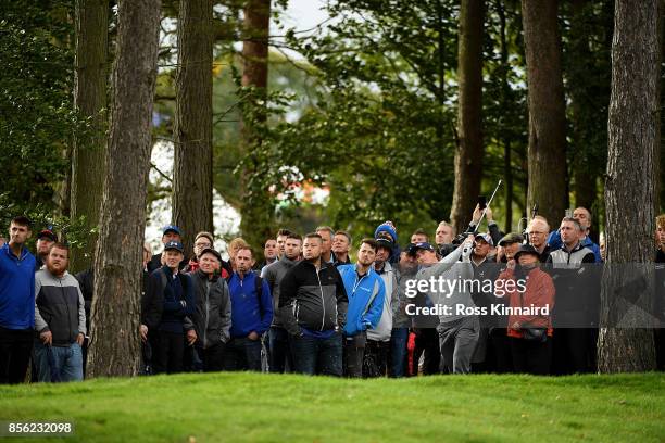Paul Dunne of Ireland hits his second shot on the 12th hole during day four of the British Masters at Close House Golf Club on October 1, 2017 in...