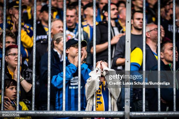 Fans of Braunschweig react during the Second Bundesliga match between Eintracht Braunschweig and FC St. Pauli at Eintracht Stadion on October 1, 2017...