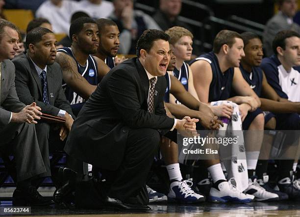 Head coach Sean Miller of the Xavier Musketeers watches their game against the Pittsburgh Panthers from the bench during the NCAA Men's Basketball...