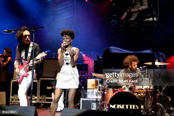 Musicians Dan Smith, Shingai Shoniwa and Jamie Morrison of Noisettes perform on stage at the Teenage Cancer Trust Concert at the Royal Albert Hall on...