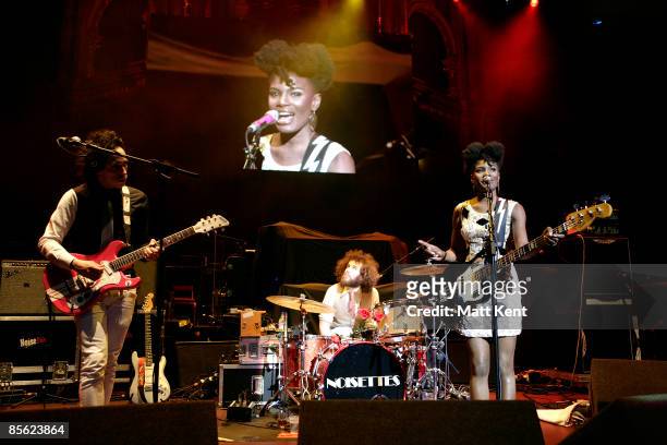 Musicians Dan Smith, Shingai Shoniwa and Jamie Morrison of Noisettes perform on stage at the Teenage Cancer Trust Concert at the Royal Albert Hall on...