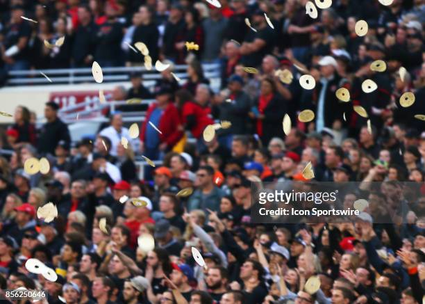 Texas Tech fans throw tortillas as the ball is kicked off at the start of the Texas Tech Raider's 41-34 loss to the Oklahoma State Cowboys on...