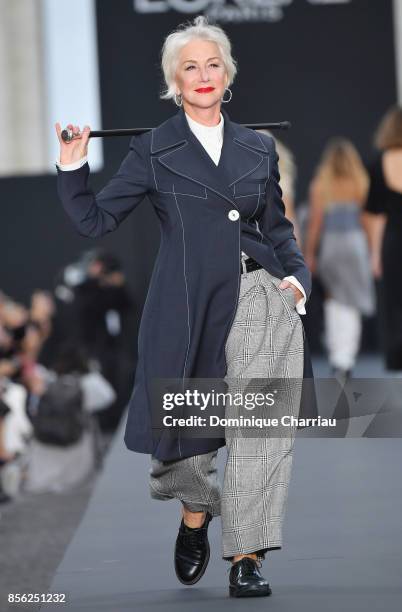 Helen Mirren walks the runway during the Le Defile L'Oreal Paris show as part of the Paris Fashion Week Womenswear Spring/Summer 2018 on October 1,...