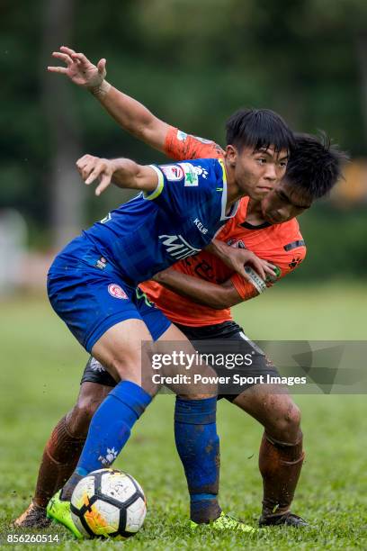 Siu Kwan Cheng of BC Rangers fights for the ball with Chun Ting Law of Sun Bus Yeun Long during the Hong Kong Premier League Week 4 match between BC...