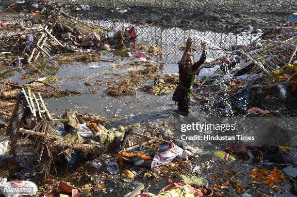 Water pollution due to immersion of Goddess Durga idols after the celebration of 9-day long festival of Durga Puja at Yamuna River Bank near ISBT, on...