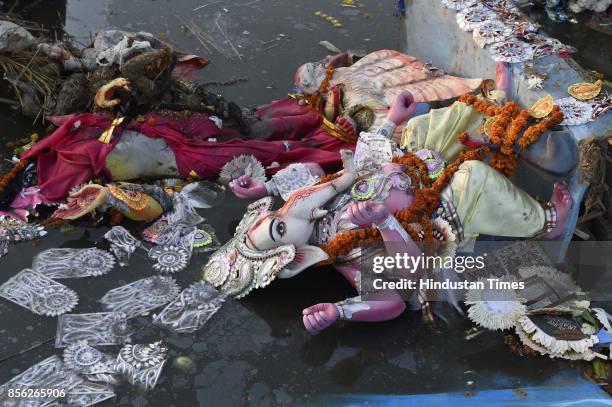 Water pollution due to immersion of Goddess Durga idols after the celebration of 9-day long festival of Durga Puja at Yamuna River Bank near ISBT, on...