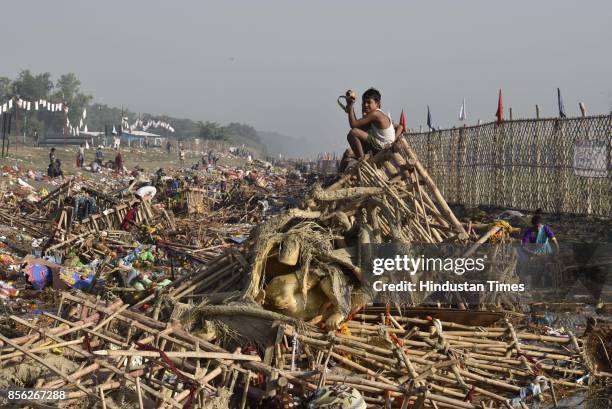 Water pollution due to immersion of Goddess Durga idols after the celebration of 9-day long festival of Durga Puja at Yamuna River Bank near ISBT, on...