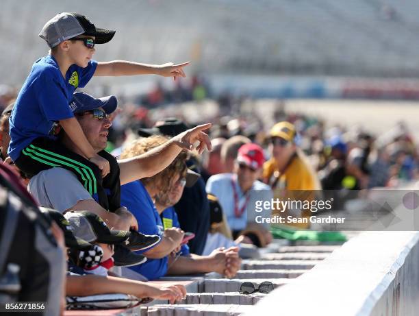 Fans look on prior to the Monster Energy NASCAR Cup Series Apache Warrior 400 presented by Lucas Oil at Dover International Speedway on October 1,...