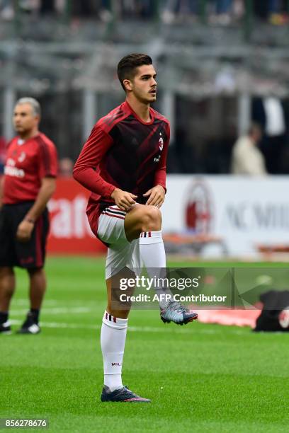 Milan's Portuguese forward Andre Silva warms up prior the Italian Serie A football match AC Milan vs AS Roma at the San Siro stadium in Milan on...
