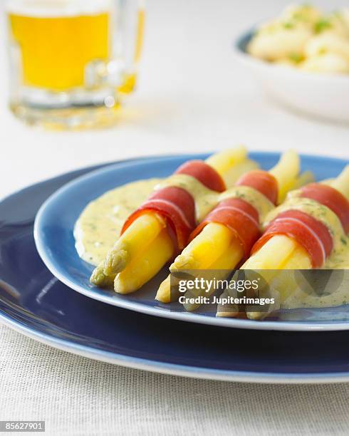 asparagus in hollandaise sauce - prosciutto wrapped stock pictures, royalty-free photos & images
