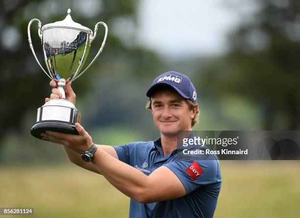 Paul Dunne of Ireland celebrates with the trophy during day four of the British Masters at Close House Golf Club on October 1, 2017 in Newcastle upon...