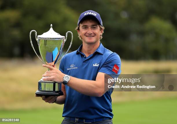 Paul Dunne of Ireland celebrates with the trophy during day four of the British Masters at Close House Golf Club on October 1, 2017 in Newcastle upon...