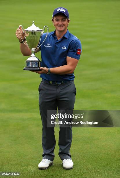 Paul Dunne of Ireland celebrates with the trophy during day four of the British Masters at Close House Golf Club on October 1, 2017 in Newcastle upon...