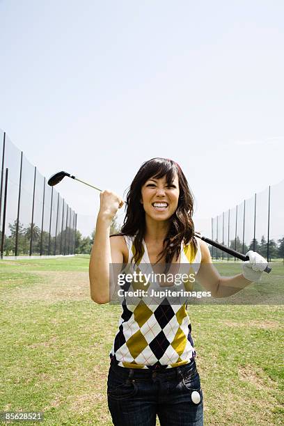 smiling hipster golfer - argyle stock pictures, royalty-free photos & images
