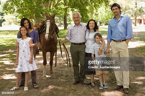 family with horse - argentina girls stock pictures, royalty-free photos & images