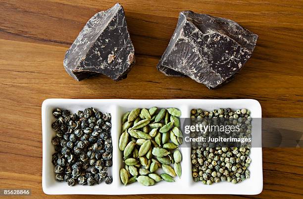 dark chocolate chunks and spices - chocolate chunks top view stock pictures, royalty-free photos & images