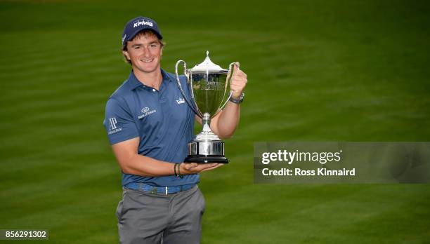 Paul Dunne of Ireland with the winners trophy after the final round of the British Masters at Close House Golf Club on October 1, 2017 in Newcastle...