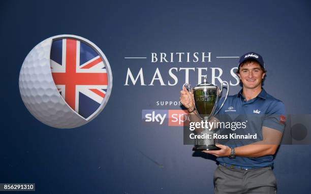 Paul Dunne of Ireland with the winners trophy after the final round of the British Masters at Close House Golf Club on October 1, 2017 in Newcastle...