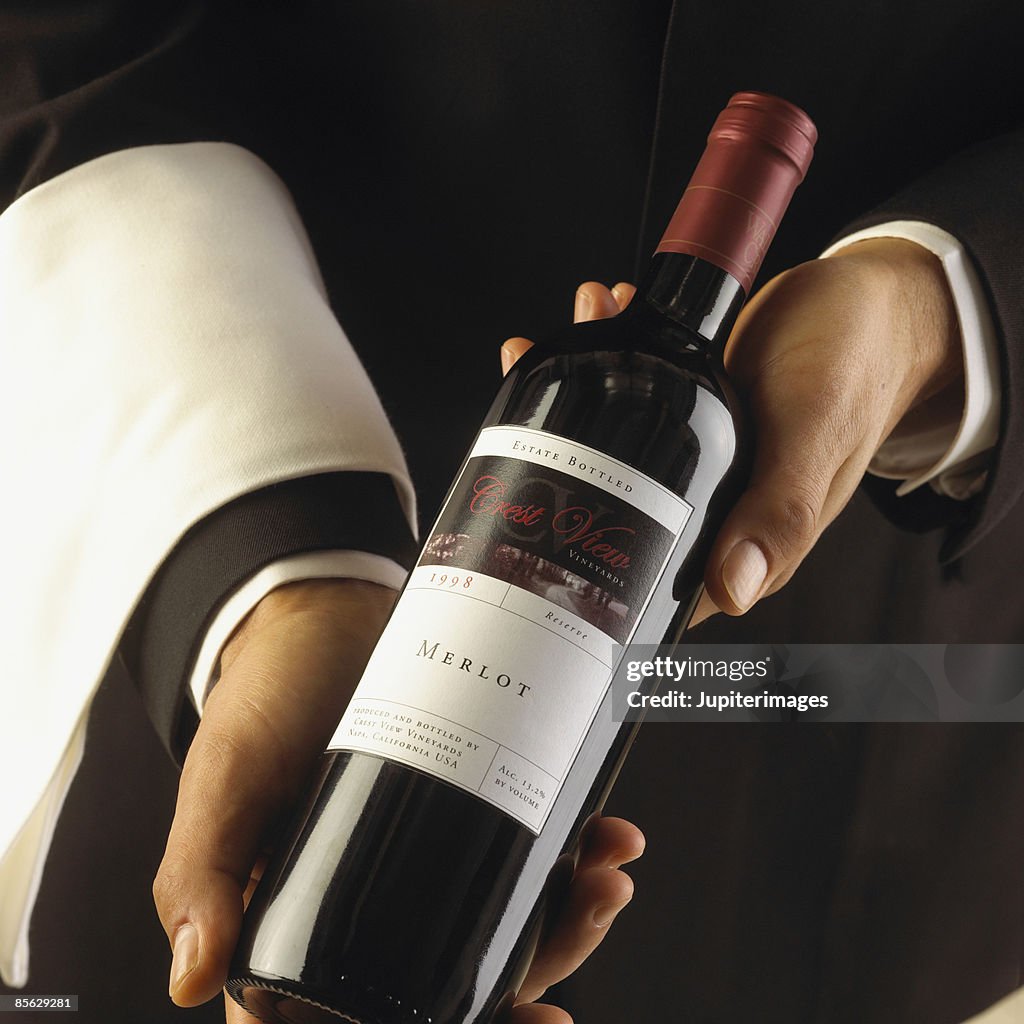 Sommelier with wine
