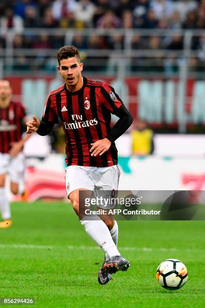 Milan's Portuguese forward Andre Silva kicks the ball during the Italian Serie A football match AC Milan vs AS Roma at the San Siro stadium in Milan...