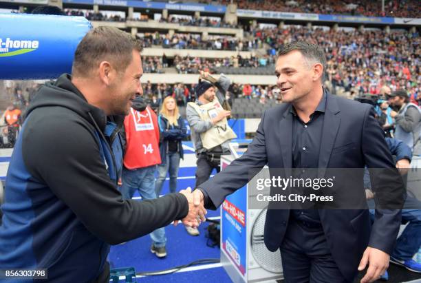 Coach Pal Dardai of Hertha BSC and coach Willy Sagnol of FC Bayern Muenchen before the game between Hertha BSC and FC Bayern Muenchen on october 1,...